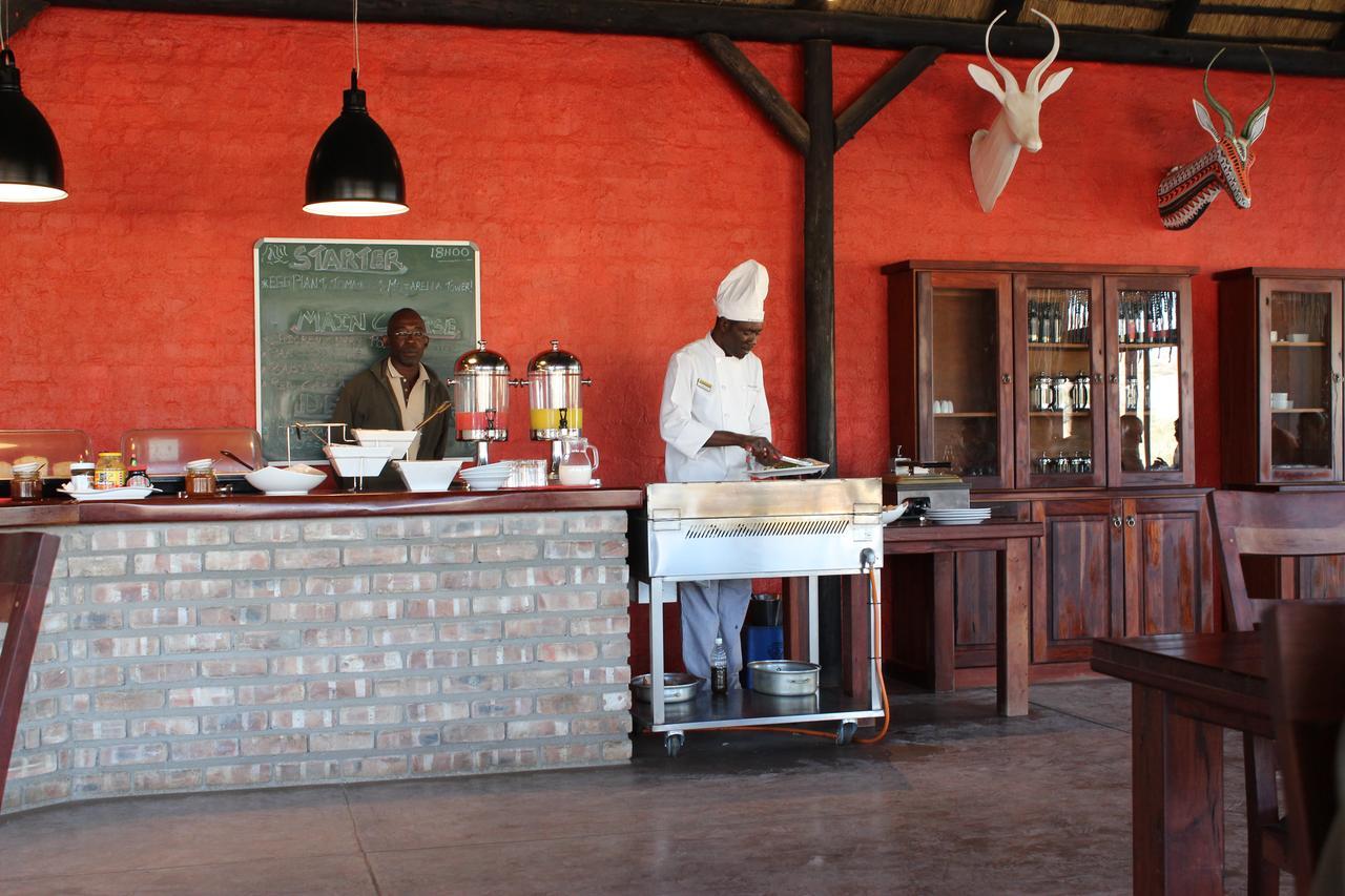 Hobatere lodge Otjovasandu Exterior foto